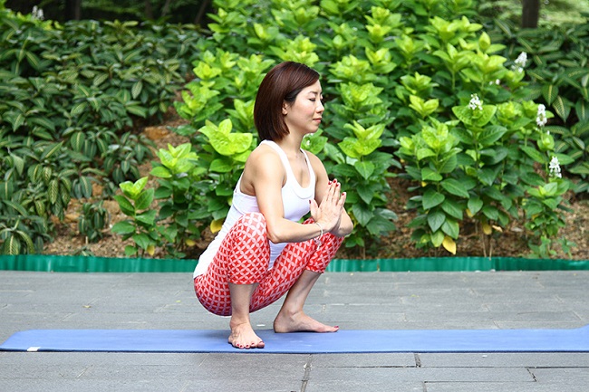 Parivrtta Malasana Revolved Garland Pose